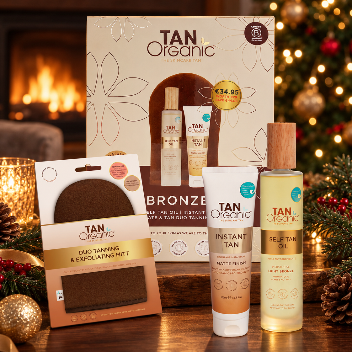 TanOrganic The Bronze Edit gift set with Self Tan Oil, Instant Tan and Duo Tanning &amp; Exfoliating Mitt in a festive Christmas setting.